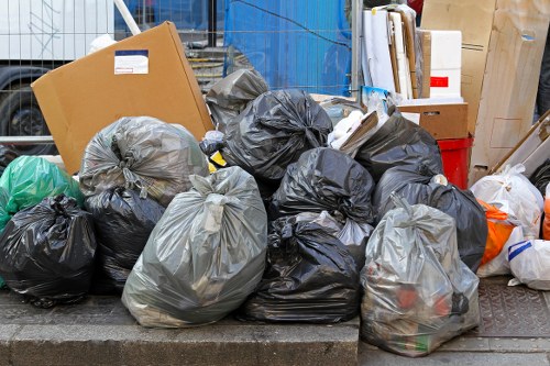 Professional house clearance team in Kenton removing furniture